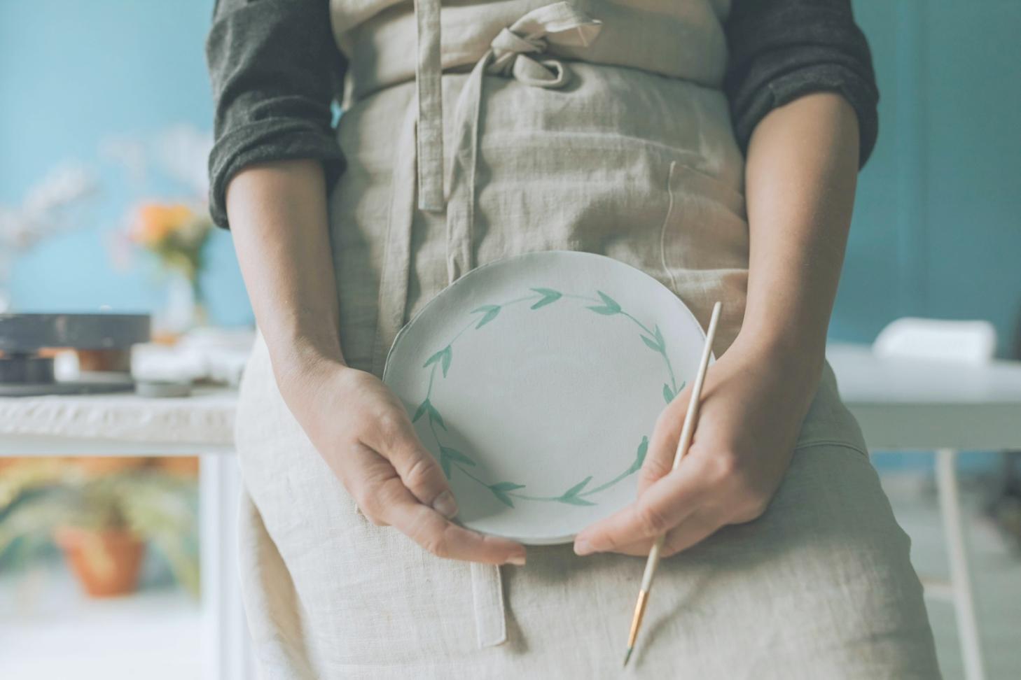 Student working on watercolor illustration project